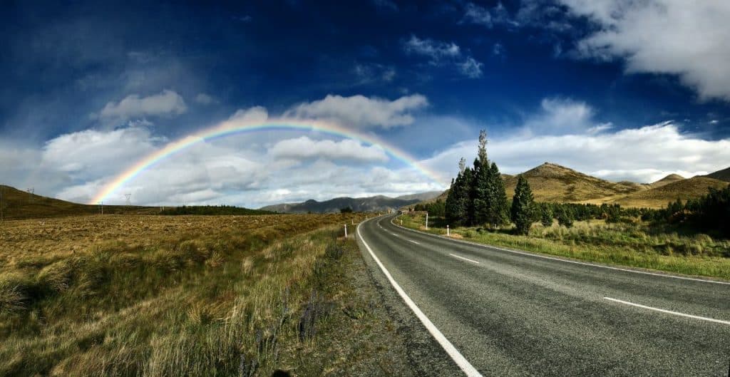 Road Trip Alone Female - Safety Tips For Women On Solo Road Trips - rainbow on the road