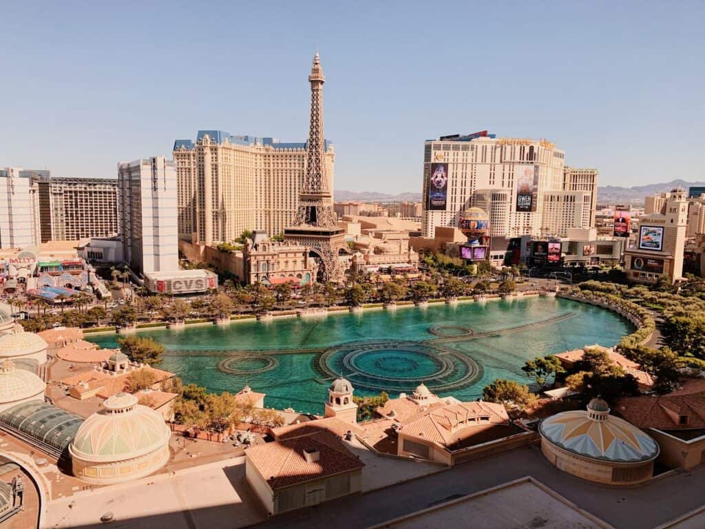Breathtaking view of Las Vegas Strip with replica Eiffel Tower and vibrant cityscape.